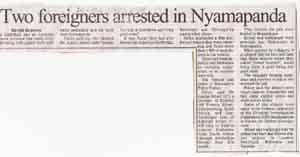 Newspaper clipping with headline "Two foreigners arrested in Nyamapanda" and article text in columns