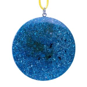 Round blue glittery pendant with sparkly surface and dark flecks, suspended from yellow cord with silver metal clasp