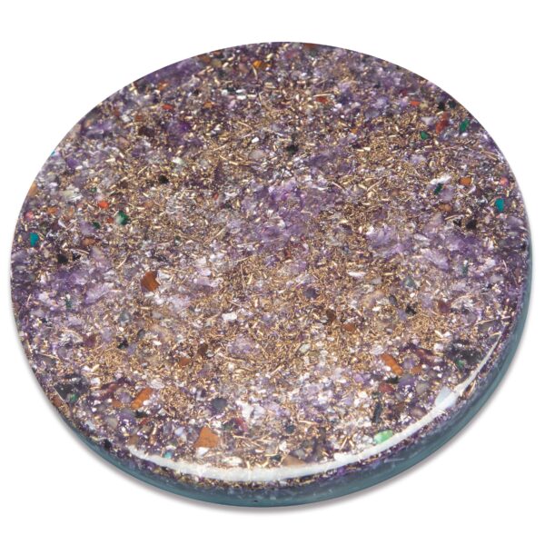 Circular purple orgonite disc with embedded crystals, metal shavings, and colorful stone fragments on white background