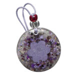 Round purple orgonite pendant with central lavender druzy stone, surrounded by purple crystal chips and glitter in clear resin