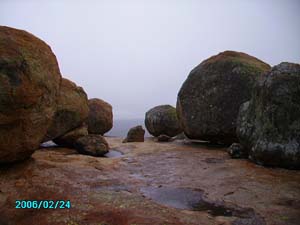 Rhodes| Grave in the rain on Orgone Energy Gifting tour to Yimbabwe