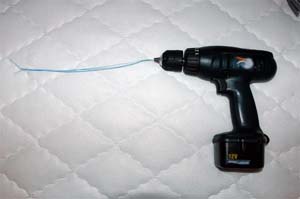 mobius coild instructions: place folded wire in chuck of cordless drill