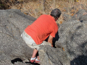 Hiding a piece of orgonite under some stones
